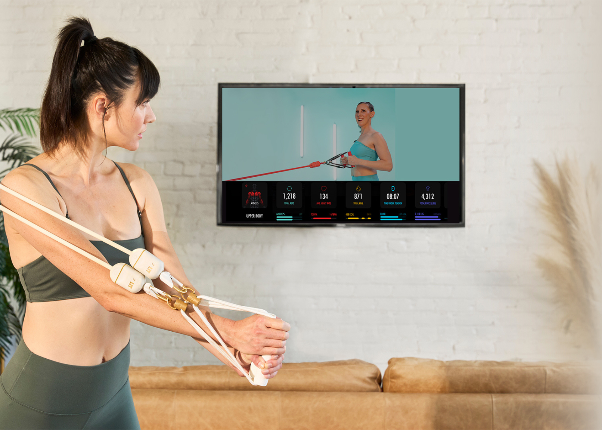 A woman doing exercise with Lit Axis resistance band