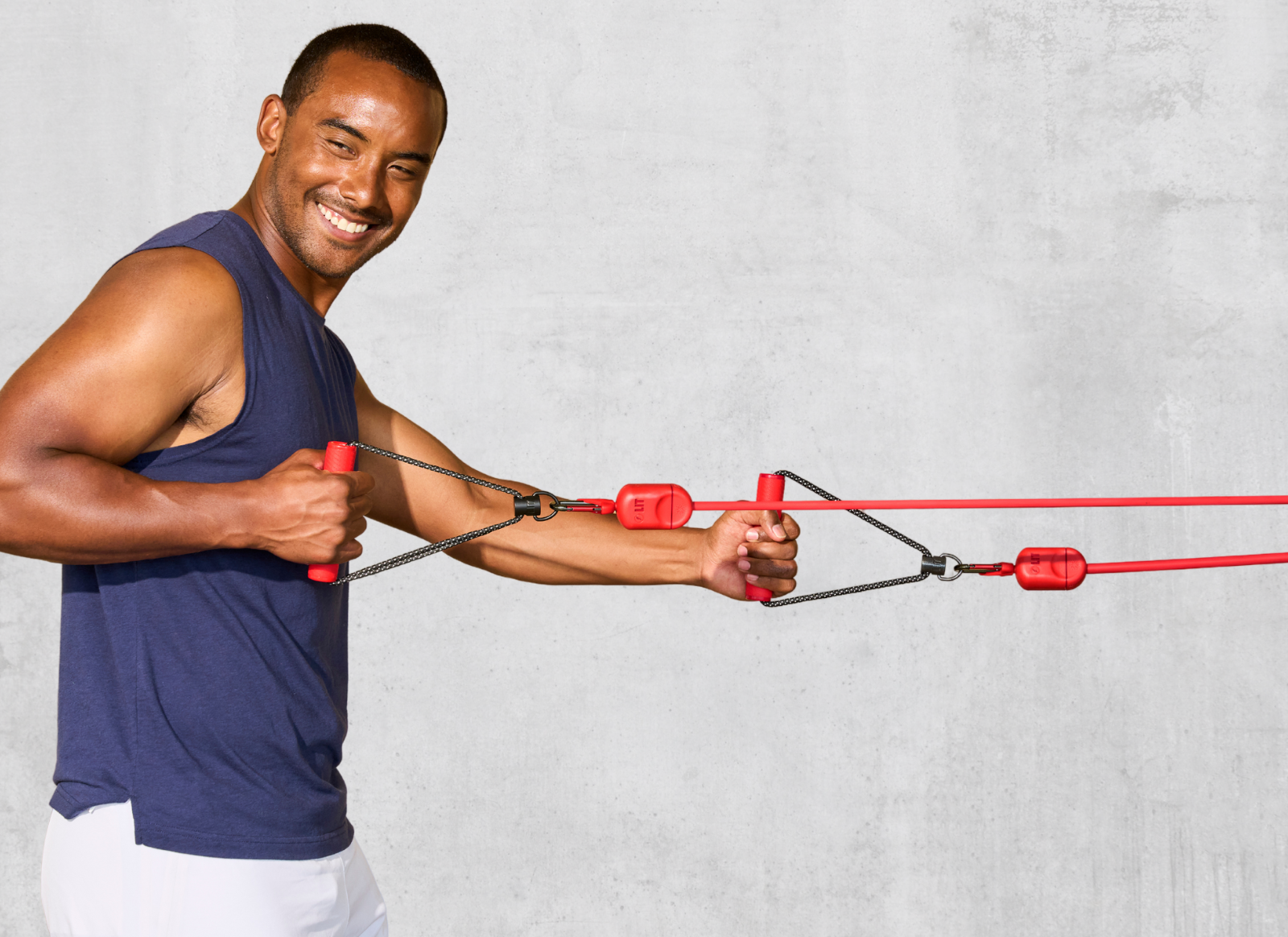 A man doing resistance band workout with LIT Axis smart resistance band