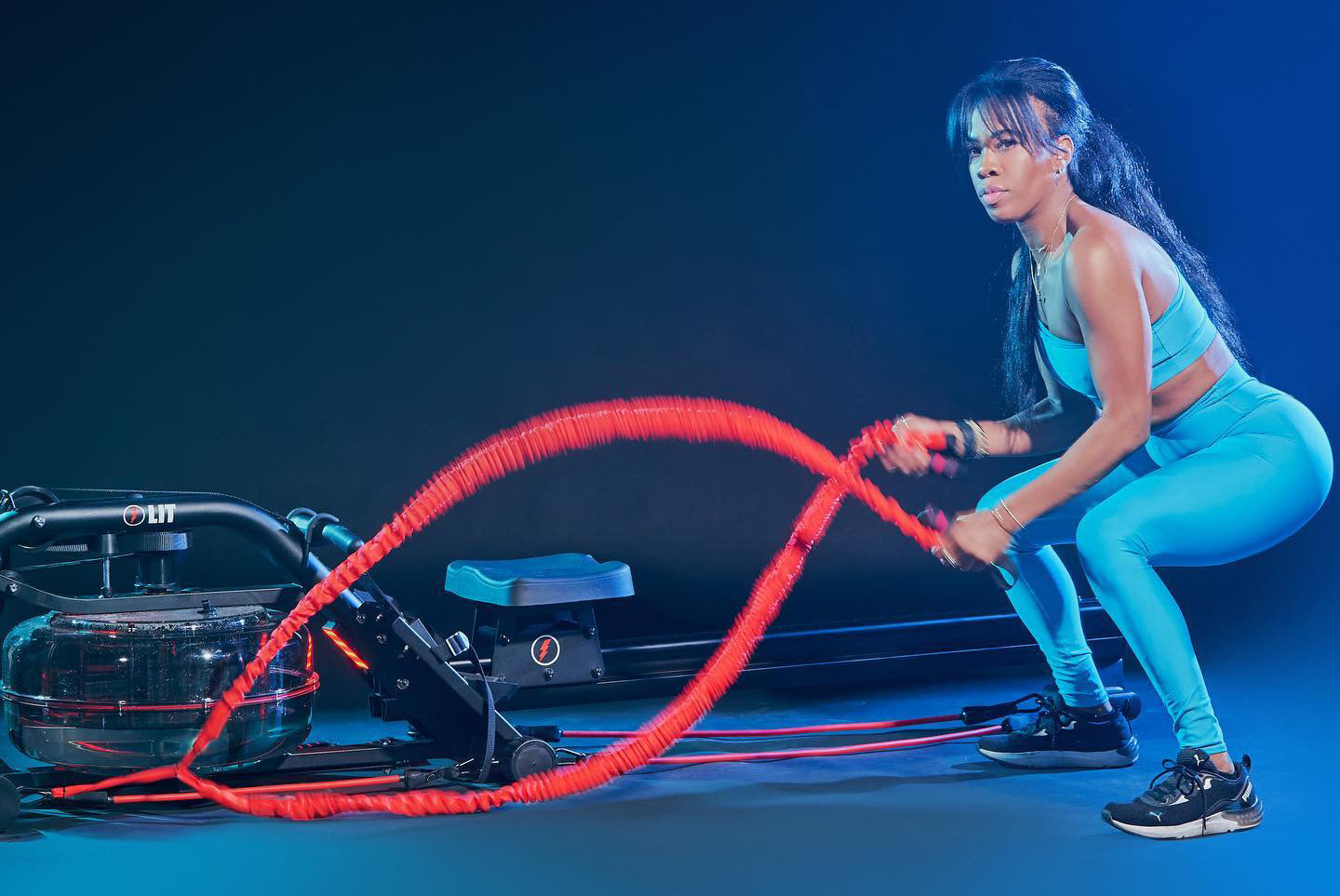 LIT Trainer Jazmin doing workout on the LIT Strength Machine